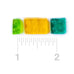 Three translucent rectangular candy or gel pieces in green, yellow, and teal, shown above a ruler scale marked 1 to 2 on a white background.