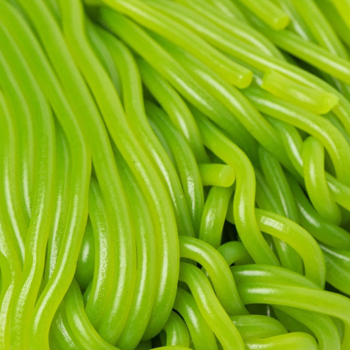 light green strings of dill pickle licorice laces
