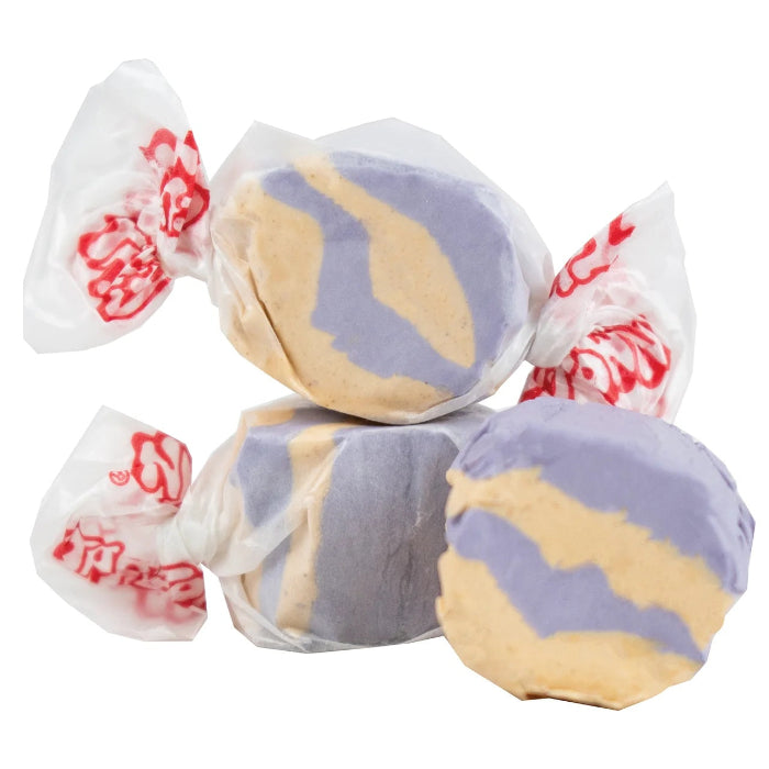Lavender and creme colored taffy wrapped in white paper